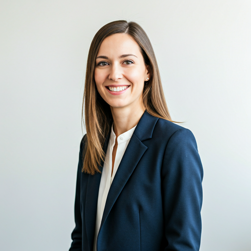 Professional woman in business attire smiling in office setting